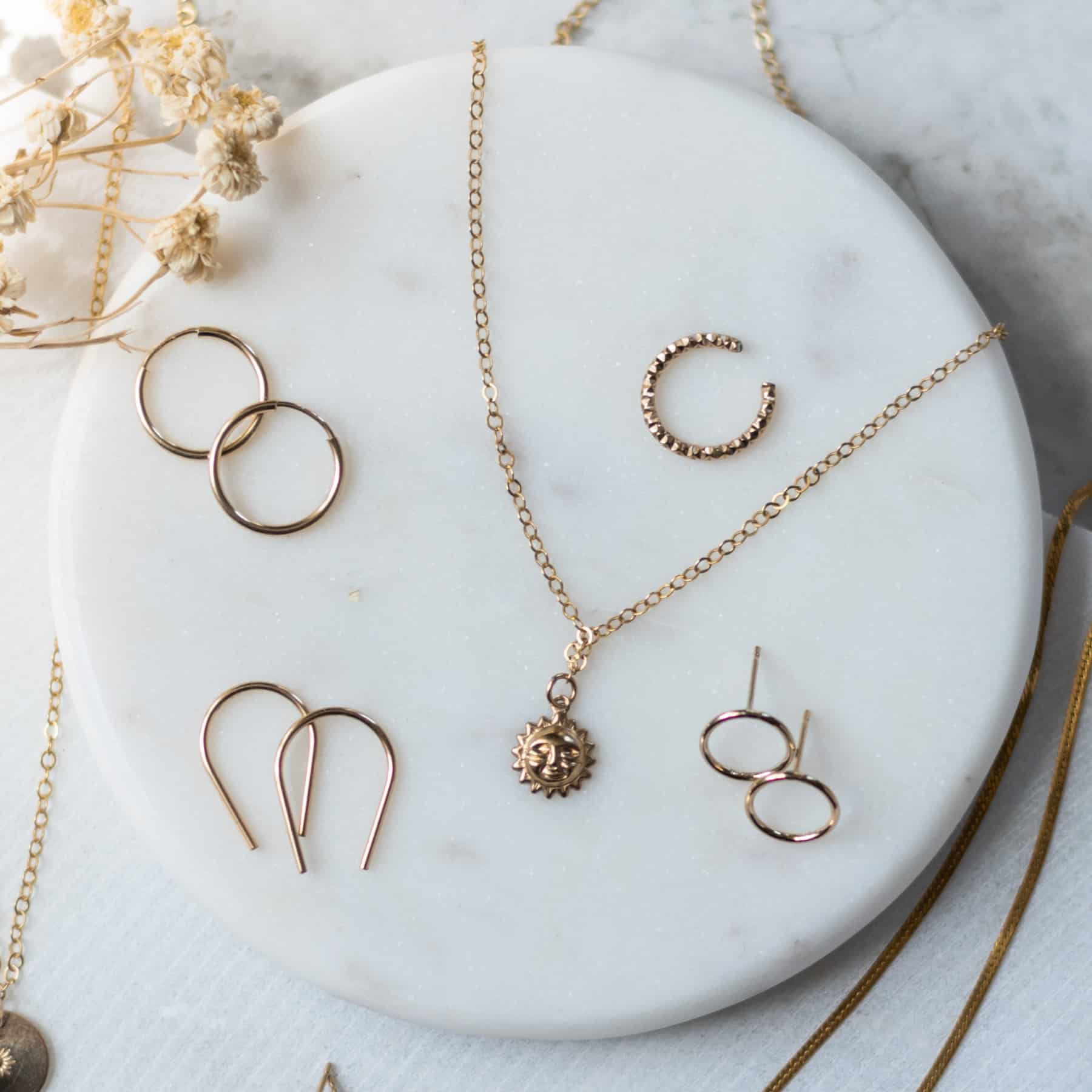 gold nap earrings