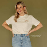 ivory unisex tshirt with sun on left chest ethically made by Sela Designs