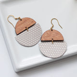 Sela Designs handmade jewelry with purpose mission charity lightweight leather earrings high quality