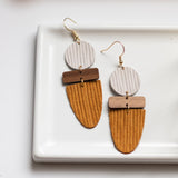 handmade leather wood statement earrings cause based sela designs